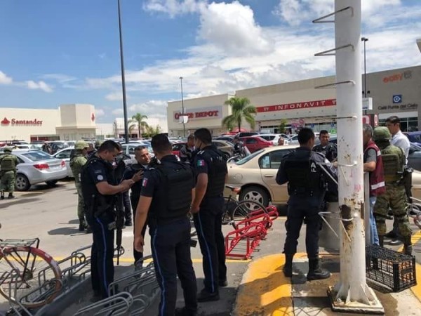 Persiguen policías municipales a candidato morenista por reporte de portación de armas de fuego