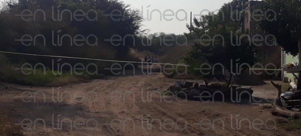 Encuentran cadáver encobijado