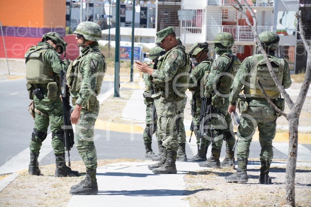 Descubren dos cuerpos maniatados en un departamento de Brisas del Campestre